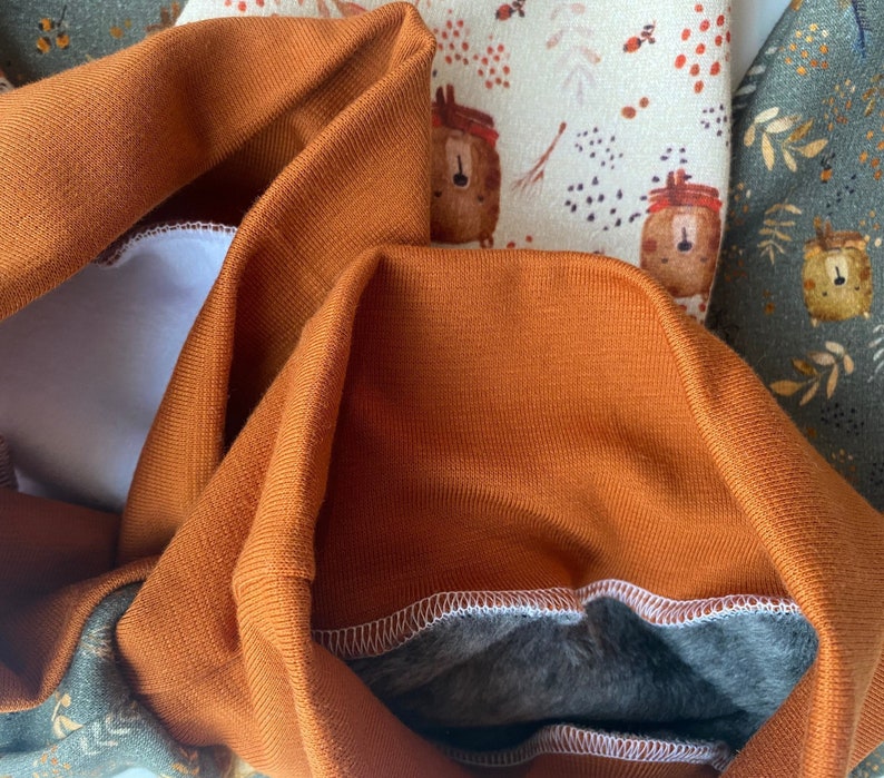 Alpenfleece, Innenseite in Orange.